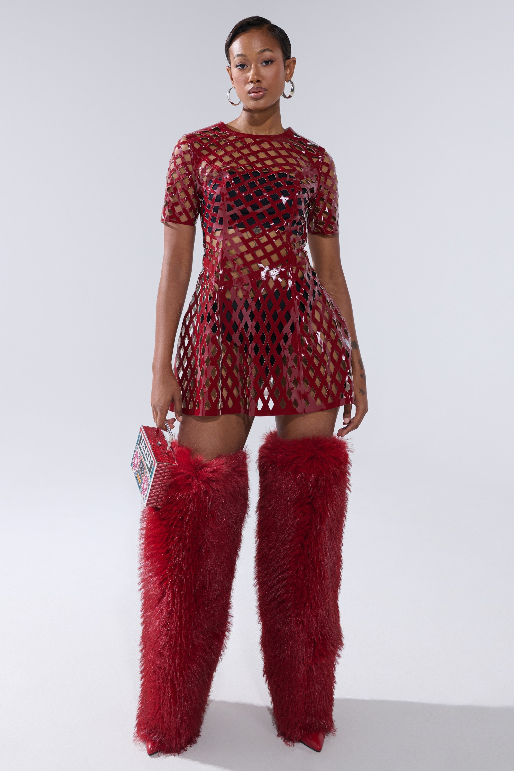 SHE'S DIFFERENT CUT OUT FAUX LEATHER MINI DRESS IN BURGUNDY