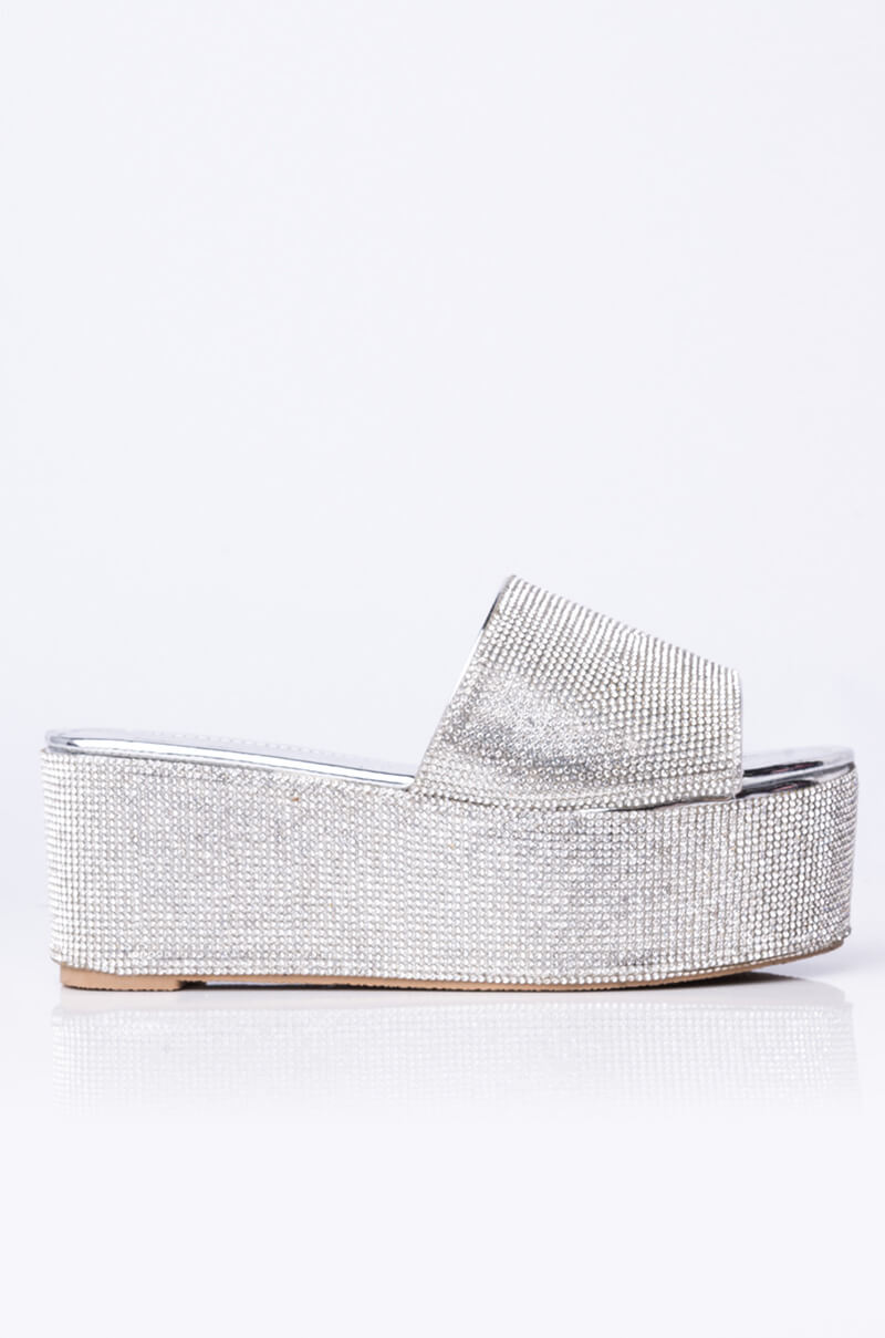 AND ANOTHER ONE SLIP ON FLATFORM SANDAL